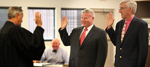 Judge Alan Foster swears in Mike Pell and Paul Hall