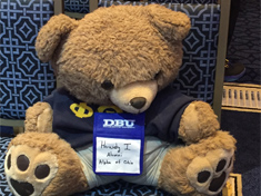 Phi Theta Kappa teddy bear participating in the Nerd Nation Conference